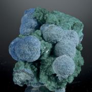 Shattuckite balls on Dioptase