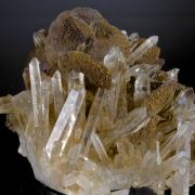 Siderite (pseudomorphing to Limonite) on Quartz