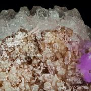 Talmessite coating Calcite and with Calcite (variety Co-bearing calcite)