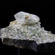 Biterminated quartz with Byssolite inclusions.