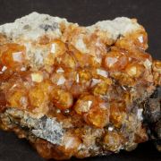 Quartz ( var. Smoky ) with Spessartine