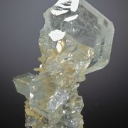 Beryl V. Goshenite -Aquamarine on Muscovite