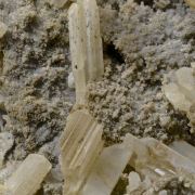 Cerussite on Quartz - elongated sixling twins