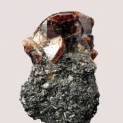 Zircon (fluor.) on Biotite and Hornblende