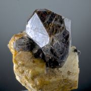 Spessartine on Orthoclase 