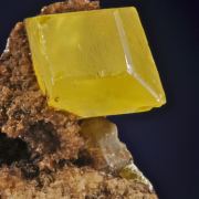 Sulphur (native crystallized with petroleum inclusions)