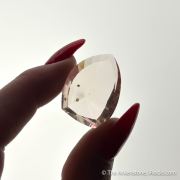 Beryl var. Morganite included by Childrenite (26.70 ct)