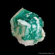 Dioptase on and included in Calcite