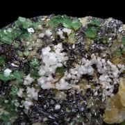 Tsavorite, Diopside on Graphite
