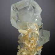 Beryl V. Goshenite -Aquamarine on Muscovite