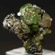 Tsavorite on Graphite