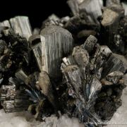 Stibnite on Calcite