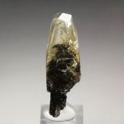 CALCITE with bitumen inclusions