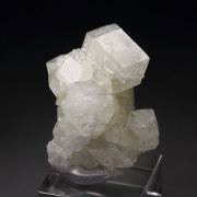 colorless GARNET var. GROSSULAR, DIOPSIDE floater