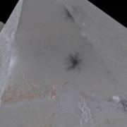 Quartz included by Hollandite stars