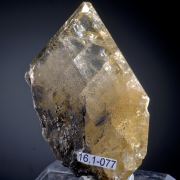 Barite (Baryte) - gemmy crystal included by Coronadite