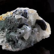 Quartz Chlorite + Hematite.