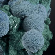 Shattuckite balls on Dioptase