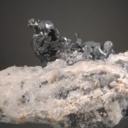 Acanthite and Polybasite on Quartz