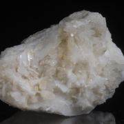 Milarite on Valencianite and Quartz