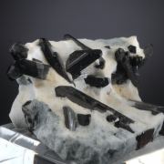 Neptunite on Natrolite