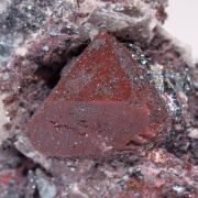 Zunyite with Hematite