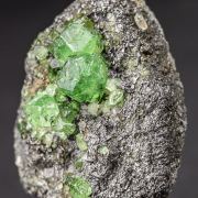 Tsavorite on Graphite