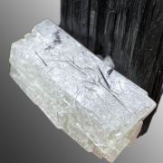 Beryl var. goshenite, tourmaline