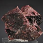 Rhodonite (blocky crystals with minor Franklinite, Calcite)
