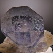 Fluorite (alternating color faces, internal bubbles)