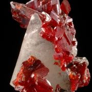 Realgar crystals on Calcite