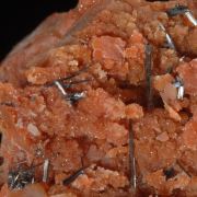 Groutite on petrified wood
