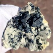 Hematite ( var. Iron Roses ) on K-Feldspar ( var. Adularia )