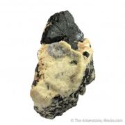 Hibonite in matrix