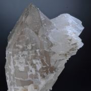 Hambergite on Smokey Quartz