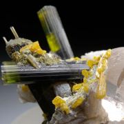 Stibiotantalite on Tourmaline, Topaz