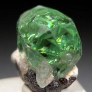 Tsavorite on Graphite