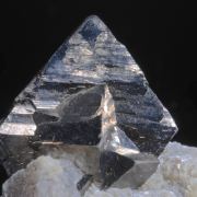 Arsenopyrite (twin) on Muscovite and Quartz