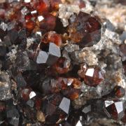 Spessartine on Hyalite Opal and Quartz