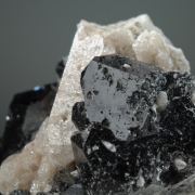 Bixbyite on Topaz