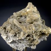 Cerussite on Quartz - elongated sixling twins