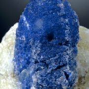 Afghanite - large crystal on Calcite