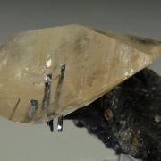 Calcite included by Stibnite