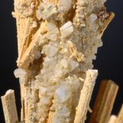 Valentinite crystals on Stibiconite ps after Stibnite