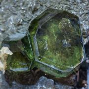 Fluorapatite with Ferberite, Siderite and Muscovite