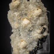 Calcite on Ferberite