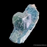 Calcite included by Malachite on Plancheite