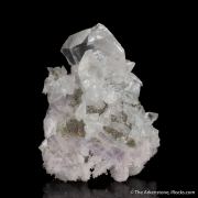 Calcite on Quartz var. Amethyst ps. Calcite