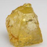 Rhodizite rough and cut set