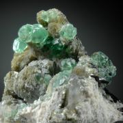 Fluorite on Muscovite, Schorl and Quartz etc.